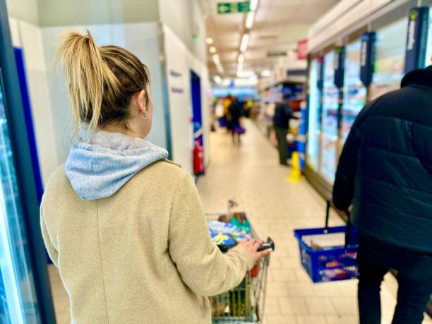 istock woman doing grocery shopping 1952377599