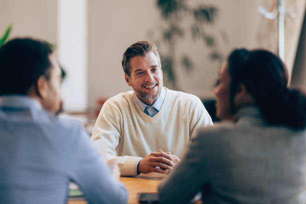 istock Negotiating Success: Businessman at a Hiring Meeting 1952381614