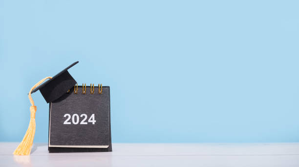istock Study goals, 2024 Desk calendar with graduation hat. The concept for Resolution, Goal, Action, Planning, and manage time to success graduate. 1952404283
