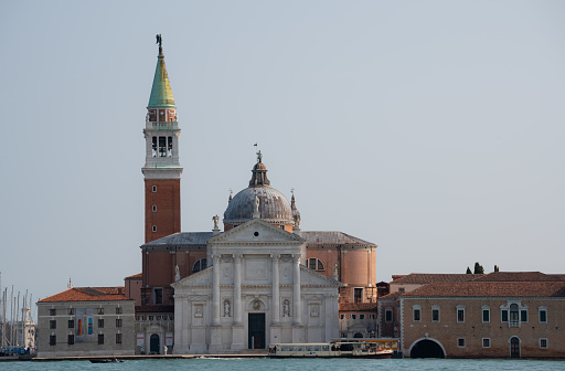 Winter sunlight falls upon the iconic shape of the Church of San Giorgio Maggiore in Venice.