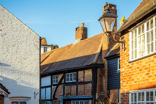 Color image depicting very old houses in Horsham, a market town in the southeast of England.