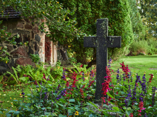 beautiful and famous medieval Johannis cemetery of Nuremberg, Germany, with Johannis church