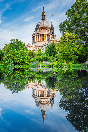 Reflection of St Paul's cathedral in the pond in London, UK