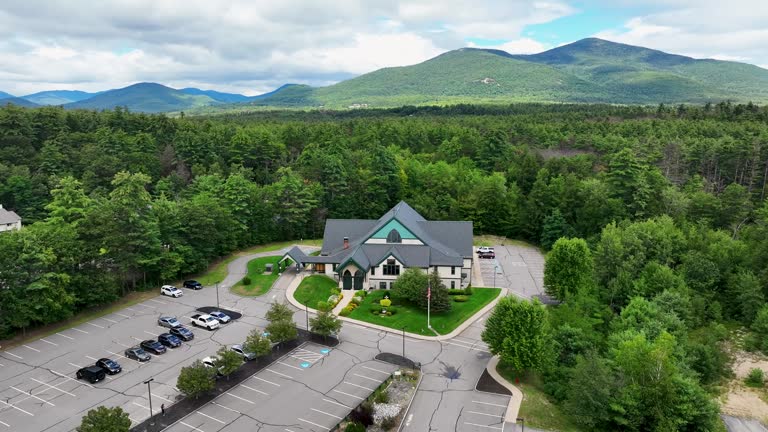 Aerial View of a Catholic Church in The White Mountains in New Hampshire in Summer (Slow Motion)