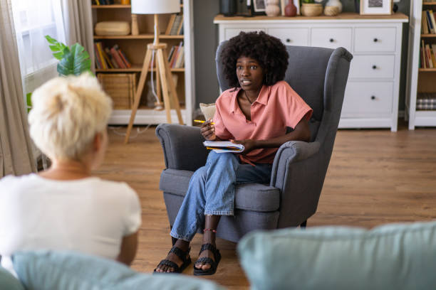 istock Therapist and client chatting in a meeting 1952565653