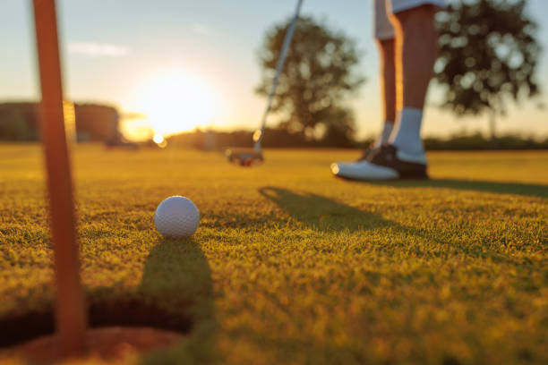 istock The golf ball is approaching the hole 1952587843