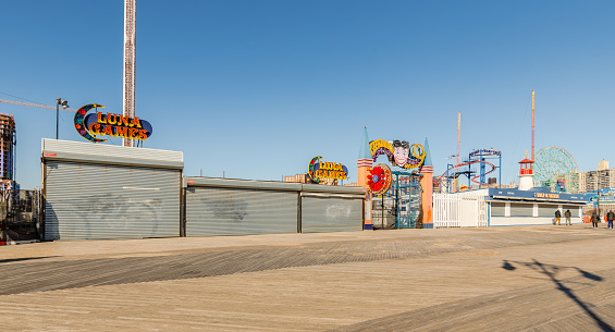 Brooklyn, New York City, USA - February 18, 2023: Facade closed Luna Games store by the sea in Coney Island closed on a winter day