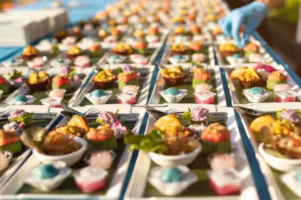 Chef decorate food and dessert before serve in canape style.