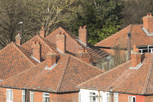 Brick semi-detached suburban houses in the UK.