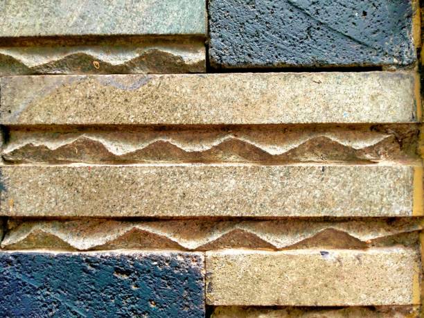 The wall is decorated with beautiful rectangular natural stone patches
