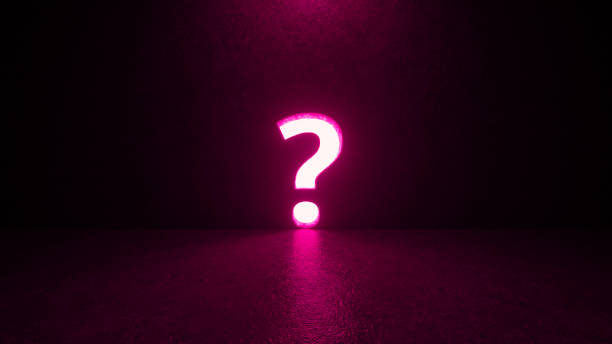 istock Pink question mark symbol on black background 1952654674