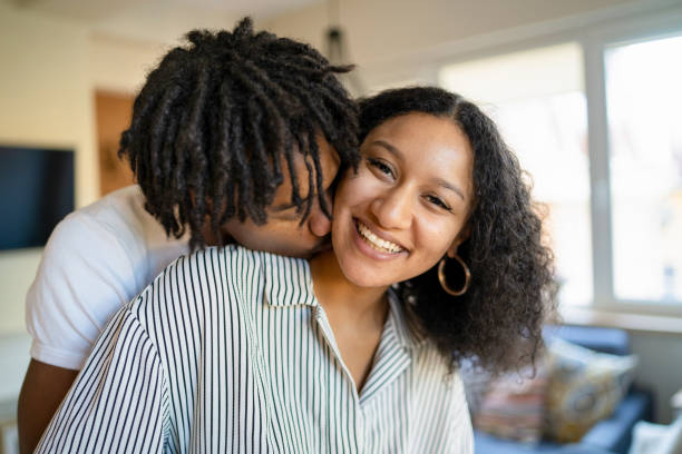 istock Husband kissing wife on the neck 1952683733