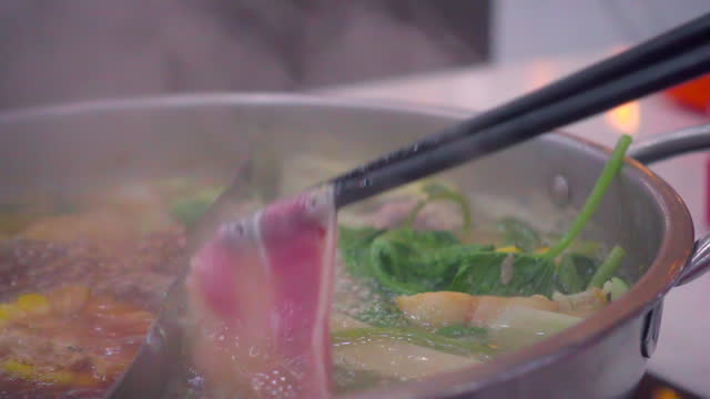 Slicing Pork Boiled In Shabu Hot Pot Slow Motion