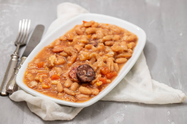 istock typical portuguese dish dobrada with beans in white dish 1952695825