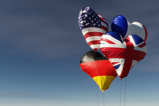 Balloons with the flags of America, England, Germany and France - 3D Illustration