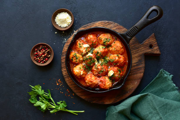 istock Meatballs with rice in tomato sauce. Top view with copy space. 1952714565