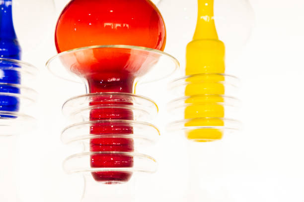Abstract colorful glass installation over white wall background