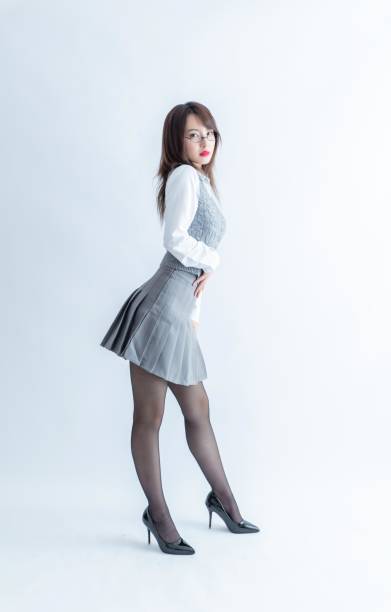 istock Asian school girl with glasses posing 1952729070