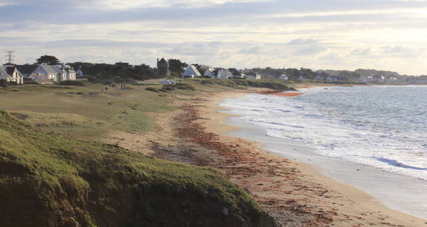 istock A walk on the beach at sunset time in Brittany 1952749683