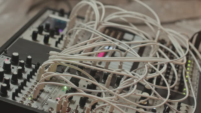 Many Audio Cables Connected to Modular Synth