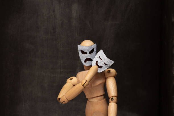 An evil, mean-spirited wooden man puts on a good mask.