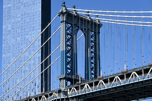 New York City, New York, USA, April 9, 2023 - The One Manhattan Square Tower with the George Washington Bridge