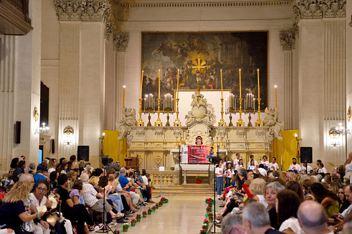 tourists and faithful listen to the choir church of Sant'Irene dei Teatini September 23 2023 Lecce Italy