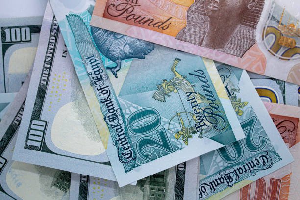 istock dollar and Egyptian banknotes currency exchange concept 1952844602