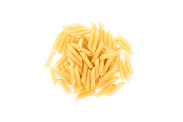 Heap of penne isolated on white background
