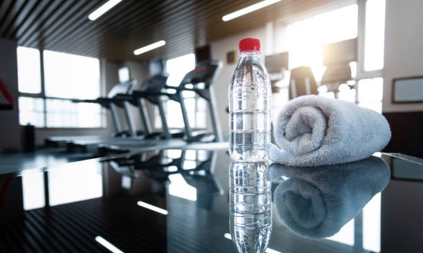 istock Towel and a bottle of water for the exercise 1952856859