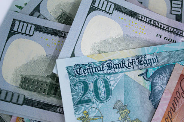 istock dollar and Egyptian banknotes currency exchange concept 1952878021