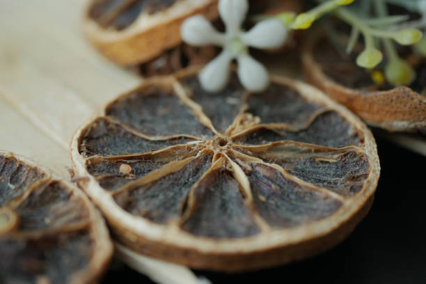 close up of dry lemon on table
