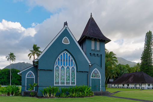 Beautiful small chapel on tropical green hill under blue summer sky. Maui Island, Hawaii, USA. Squared. Hasselblad 50MPixel Squared Crop.