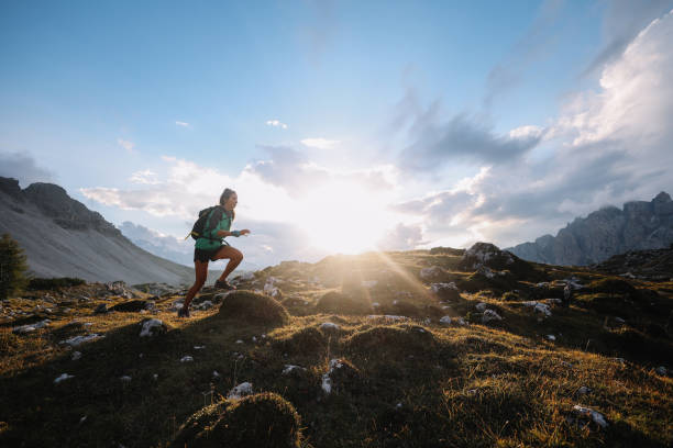 istock running through the Italian Alps 1952928395