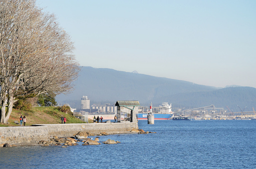 Beautiful view of the Stanley Park Seawall during a fall season in Vancouver, British Columbia, Canada.