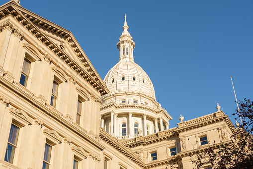 Late fall at the Michigan State Capitol building in Lansing, Michigan.  USA.