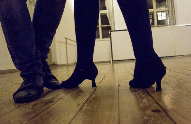 pair of dancers dancing in the studio