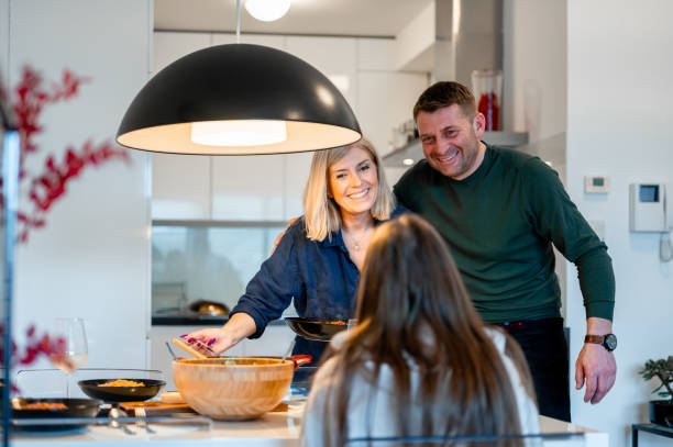 istock Family having lunch at home 1953001079