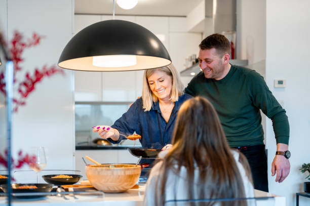 istock Family having lunch at home 1953001127