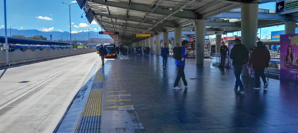 Several people waiting and walking in the transmilenio station in Bogota Colombia Jan 22/2024