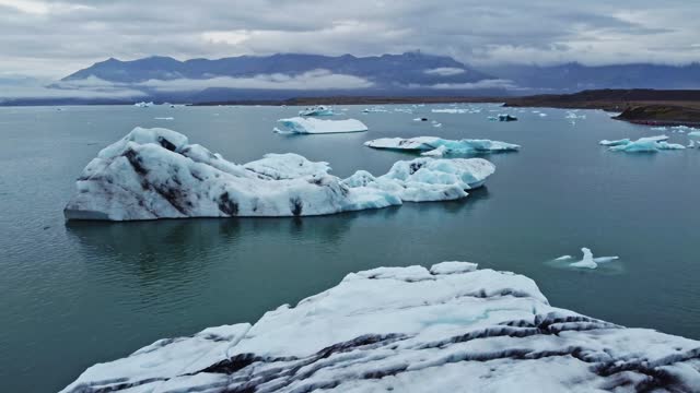 Wide drone shot of Jökulsárlón the glacier lagoon in Iceland during summer