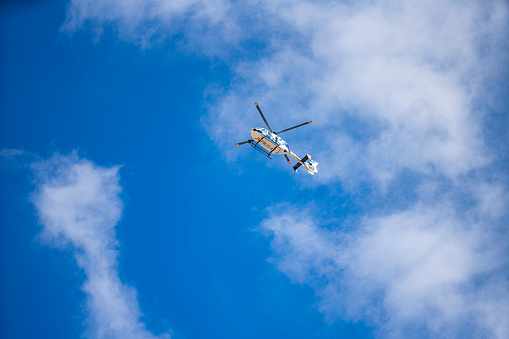 Valencia, Spain. October 9, 2023. Helicopter of the Spanish national police over Valencia during local holiday