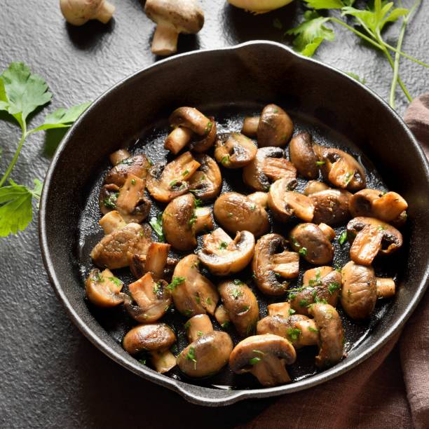 istock Roasted mushroom in cast iron pan 1953061654