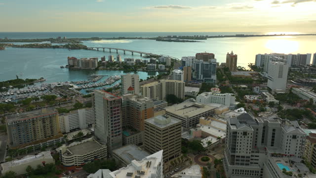 Sarasota city, Florida with waterfront office highrise buildings. Development of housing and transportation in the US.