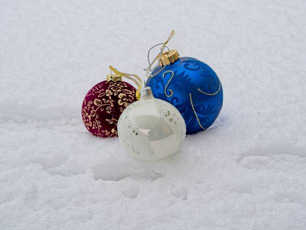 istock Christmas decorations on the snow 1953096008