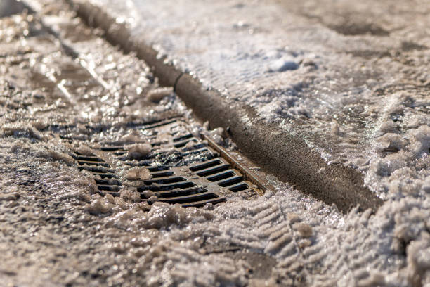a icy gully cover with footpath in winter