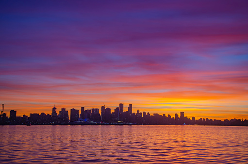 Colorful winter sunset from North Vancouver with a view of downtown Vancouver, BC