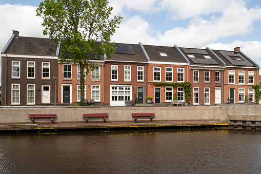 Modern houses along the quay in the Dutch town of Steenwijk in Overijssel.