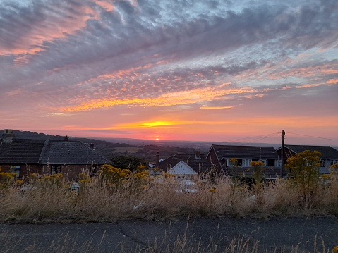 Sunset landscape with houses