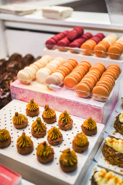 istock Colorful macarons displayed with sweet food 1953139327